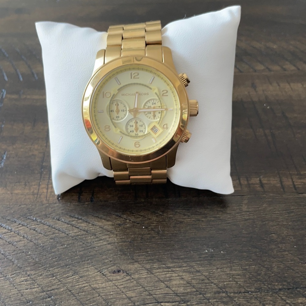 Men’s Michael Kors gold watch